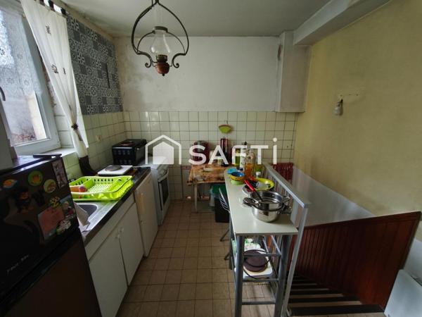 Maison de ville actuellement louée