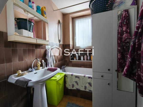 Maison de ville actuellement louée