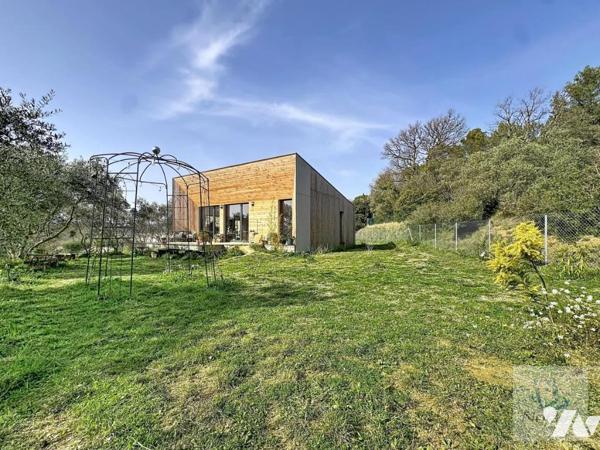 Maison en bois bioclimatique de 66.31 m² + appartement indépendant de 25 m² sur terrain de 1 974 m²
