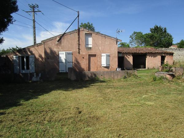 Maison avec garage et jardin