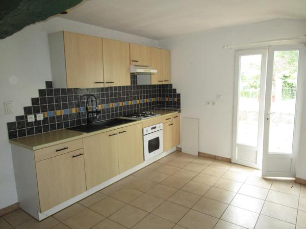 Maison avec garage et jardin