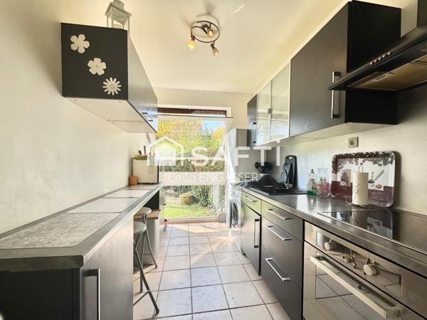 Appartement 2 pièces - Rez-de-jardin - Place de parking et cave