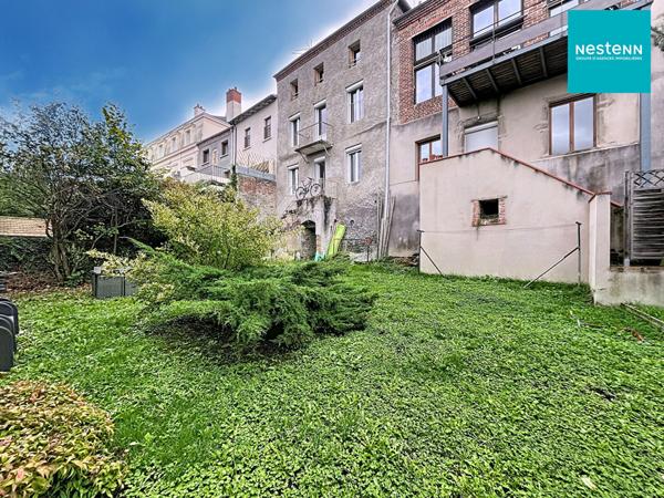 Immeuble hyper centre historique de Saint-Rambert avec jardin de 250 m² et garage