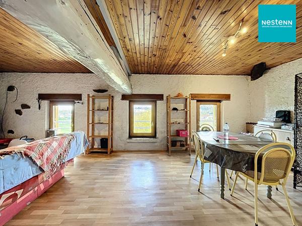 Immeuble hyper centre historique de Saint-Rambert avec jardin de 250 m² et garage