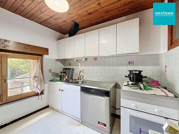 Immeuble hyper centre historique de Saint-Rambert avec jardin de 250 m² et garage