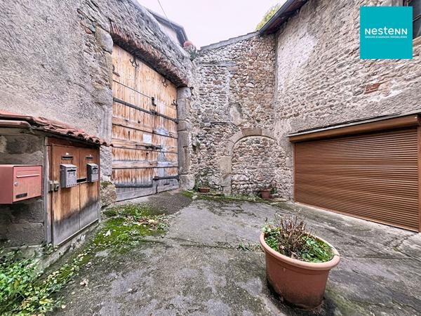 Immeuble hyper centre historique de Saint-Rambert avec jardin de 250 m² et garage