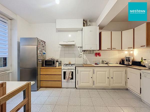 Immeuble hyper centre historique de Saint-Rambert avec jardin de 250 m² et garage