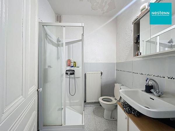 Immeuble hyper centre historique de Saint-Rambert avec jardin de 250 m² et garage