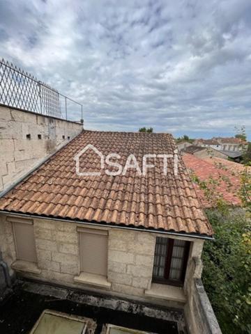 immeuble de rapport a rafraichir beaucoup de possibilités (quartier l Houmeau)