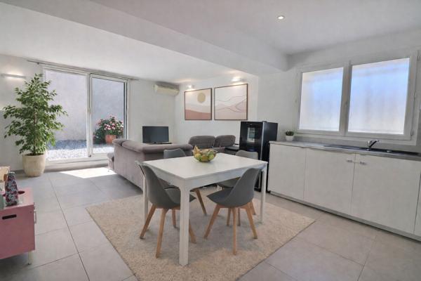 Appartement T3 de 70 m2 avec jardin de 165m2