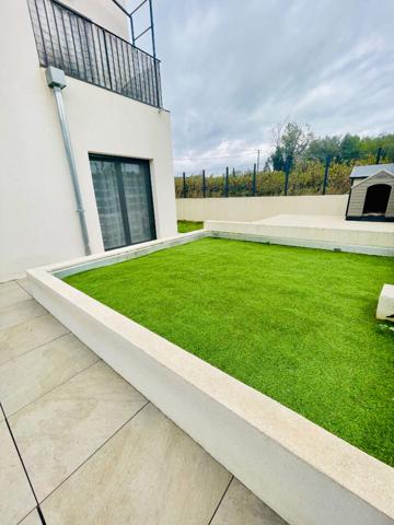 Appartement de type 3  avec terrasse et jardin