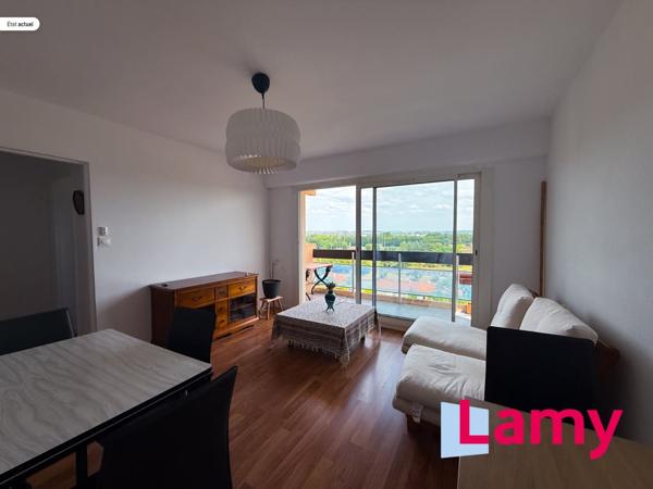 Appartement + cave + stationnement