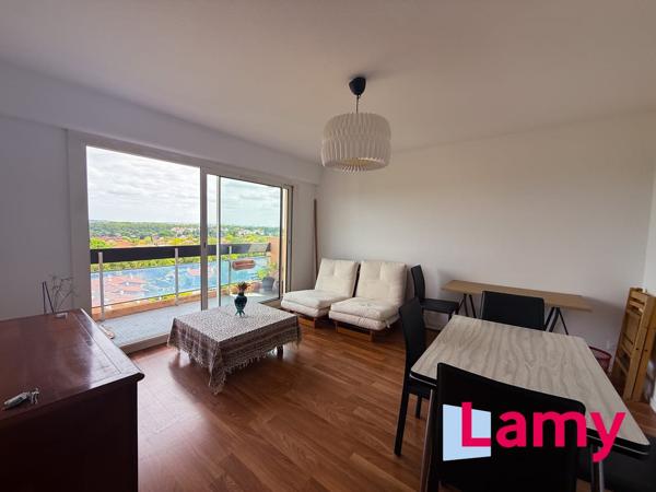 Appartement + cave + stationnement