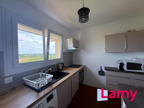 Appartement + cave + stationnement