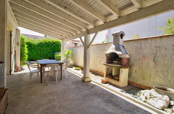 AGEN - Maison de 126 m² composée de 4 chambres, d'une terrasse couverte et d'un garage fermé.