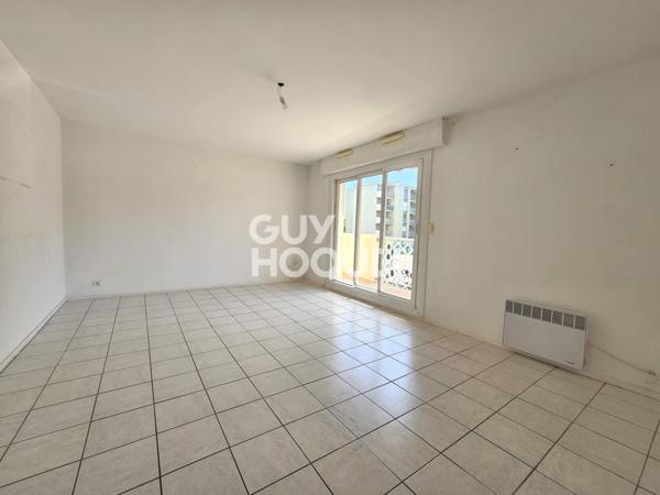 grand T3 avec balcon, garage et parking