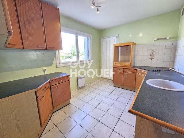 grand T3 avec balcon, garage et parking