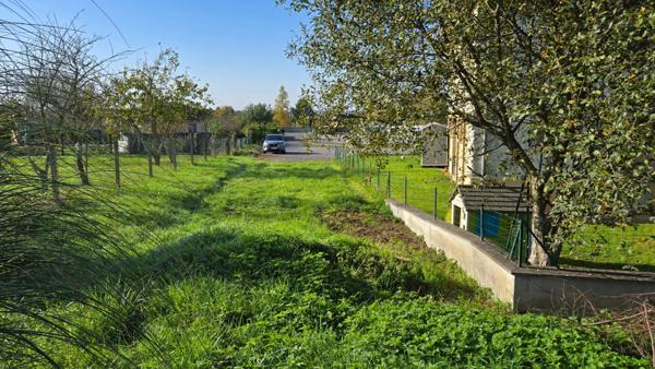 TERRAIN CONSTRUCTIBLE ORADOUR SUR GLANE - 1406M² - HYPER CENTRE-BOURG