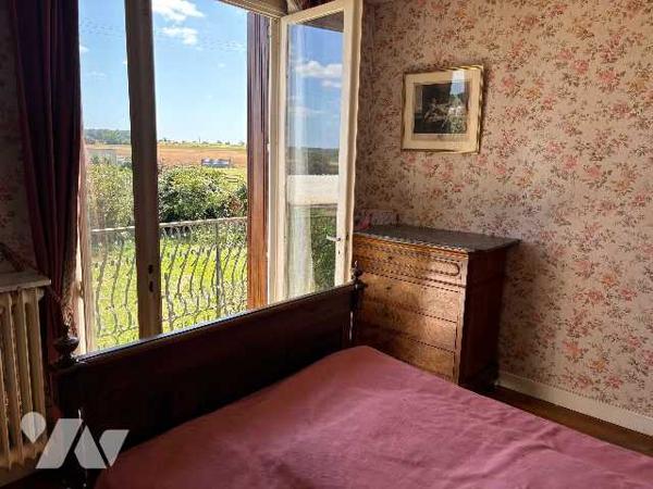 Maison des années 70 d'environ 130 m² avec jardin clos