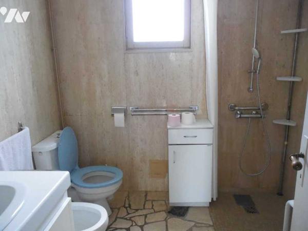 Maison des années 70 d'environ 130 m² avec jardin clos