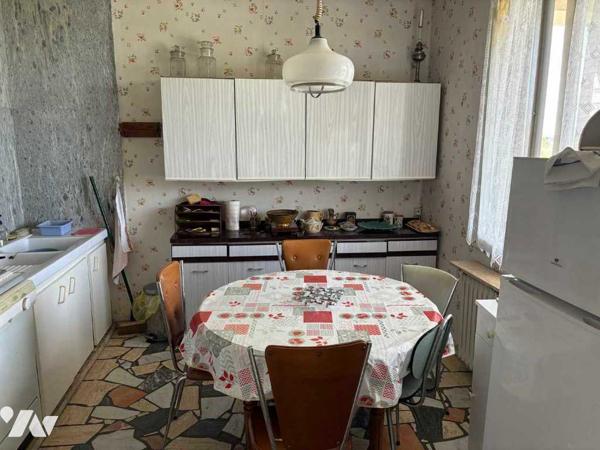 Maison des années 70 d'environ 130 m² avec jardin clos