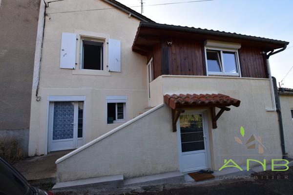 Maison avec terrain attenant constructible