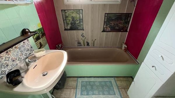 Mobil home avec assainissement, garage et jardin