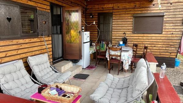 Mobil home avec assainissement, garage et jardin