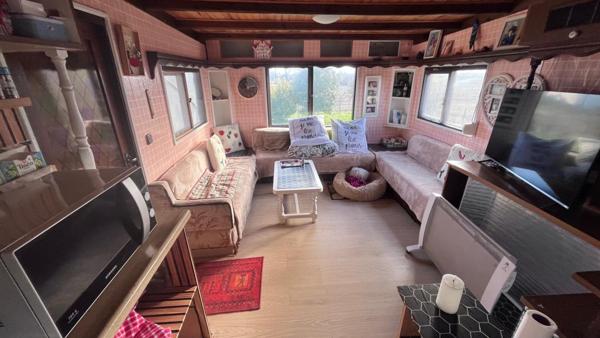 Mobil home avec assainissement, garage et jardin