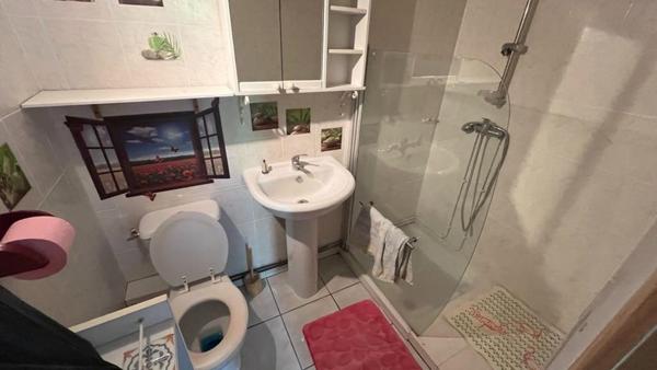 Mobil home avec assainissement, garage et jardin