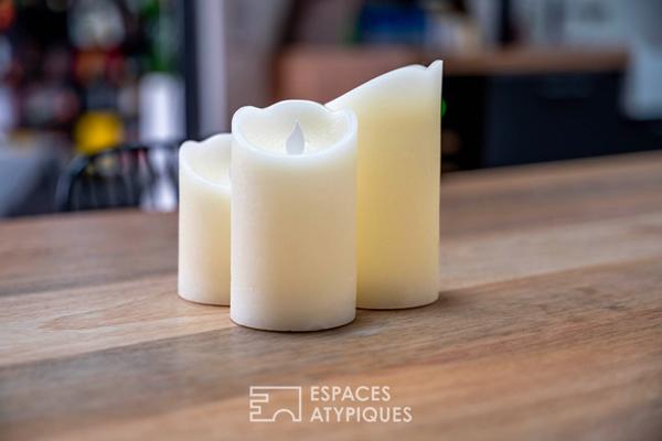 Appartement de type loft avec balcon dans une ancienne usine réhabilitée