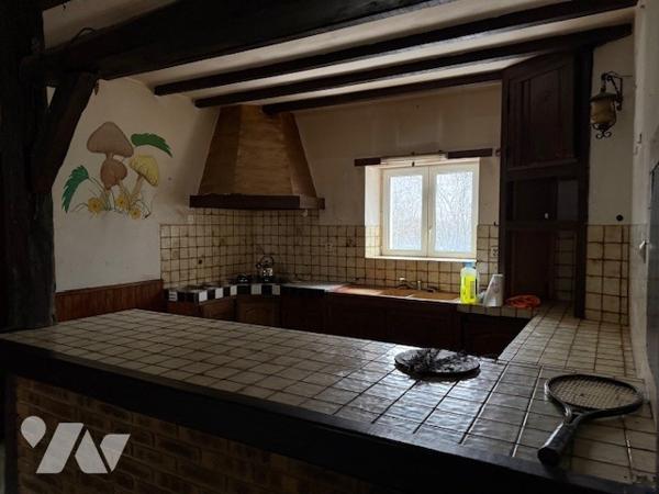 Maison mitoyenne à restaurer