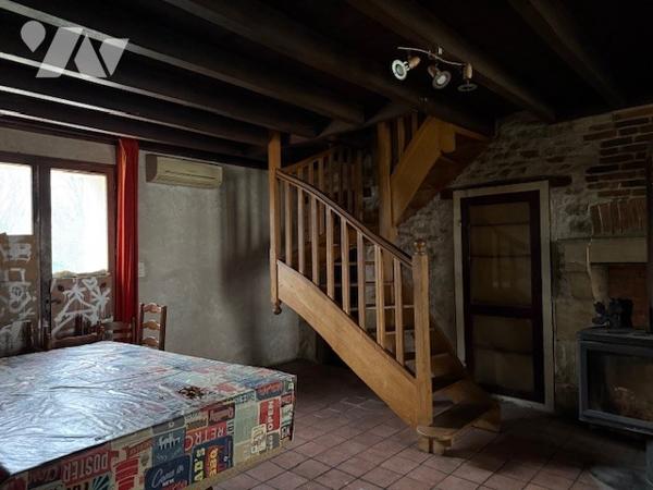 Maison mitoyenne à restaurer