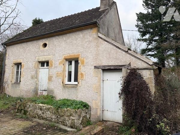 Maison mitoyenne à restaurer