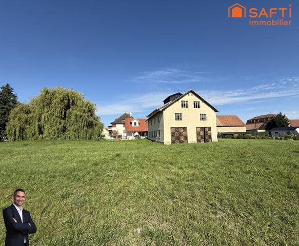 Superbe appartement de 4 pièces disposant d'une terrasse, d'un jardin, d'un double garage et de 2 places de stationnement privées !