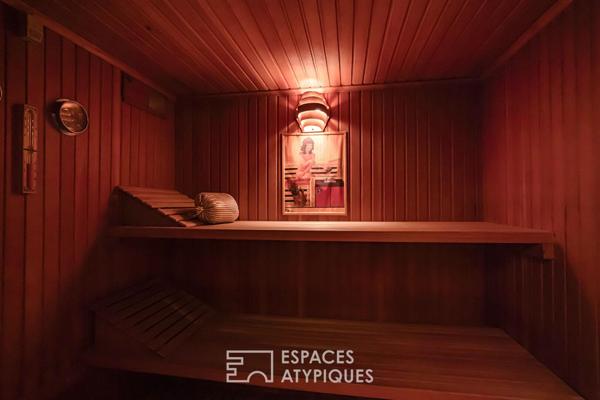 Maison d’architecte seventies à fort potentiel et son vaste terrain boisé