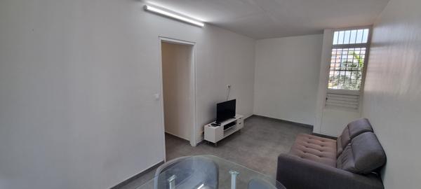 Appartement 3 pièces rénové et meublé d'environ 56 m² à POINTE-A-PITRE