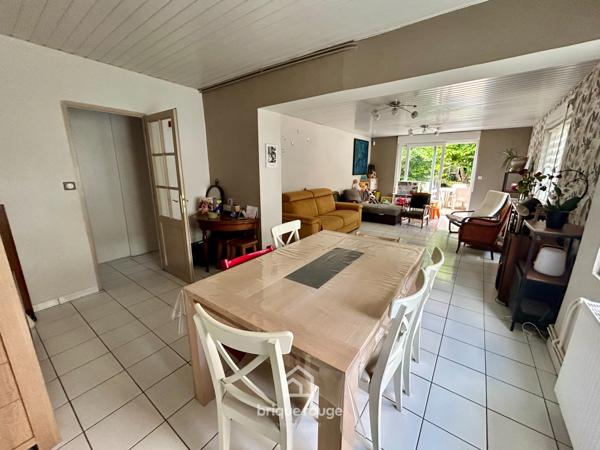 Maison semi-individuelle avec jardin et garage