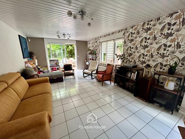 Maison semi-individuelle avec jardin et garage