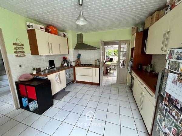 Maison semi-individuelle avec jardin et garage