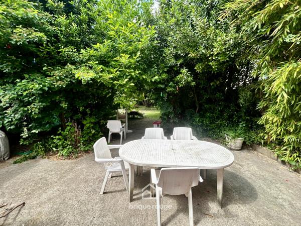 Maison semi-individuelle avec jardin et garage