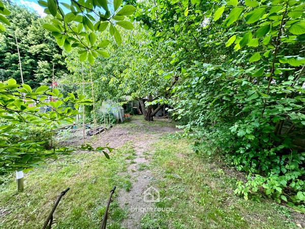 Maison semi-individuelle avec jardin et garage