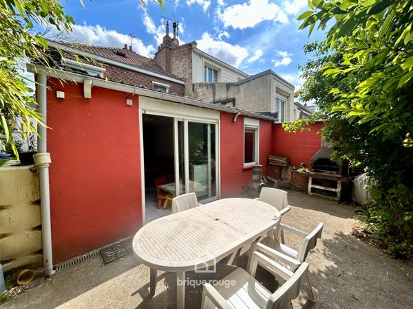 Maison semi-individuelle avec jardin et garage