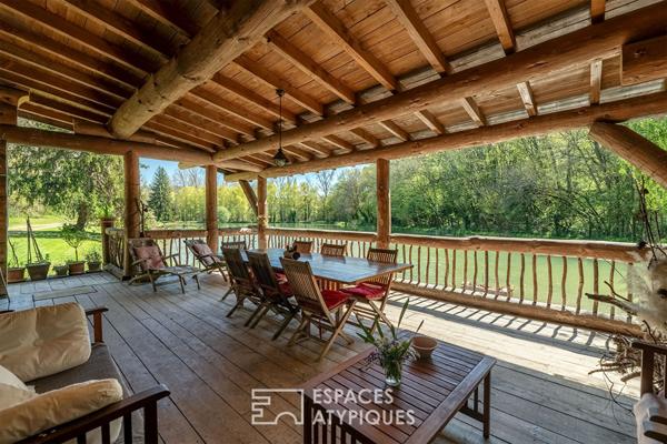 La Maison en bois, son étang et son exceptionnel environnement