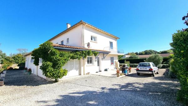 Maison familiale spacieuse avec jardin