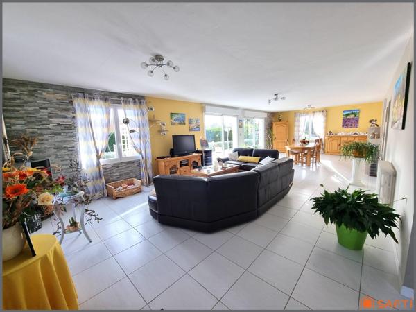 Maison familiale spacieuse avec jardin