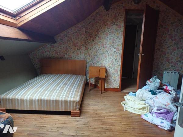 A VENDRE à BOUGUENAIS Maison à rénover de plain-pied avec garage et jardin