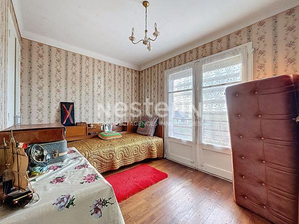Maison à vendre 3 chambres avec jardin et double garage.