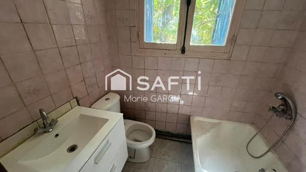 Mazet nîmois à rénover sur 1 200 m² arborés