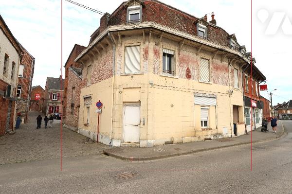 Immeuble de rapport 6 logements et grand local aménageable - rentabilité locative élevée.